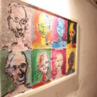 Quadro de pintura com oito rostos não identificados