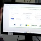 Tela de computador com o site do Portal Nacional da NFS-e na tela