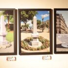 Fotos de monumentos expostos em parede de museu
